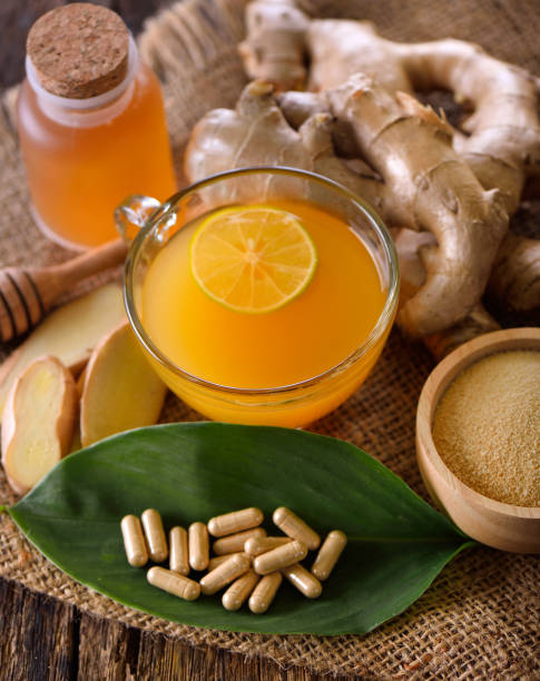 istock ginger tea on wooden background 936223730