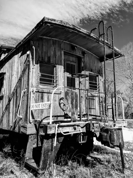 Black and White photo ot a old train car