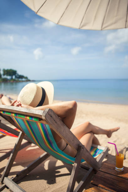 istock Woman on the beach 936258032