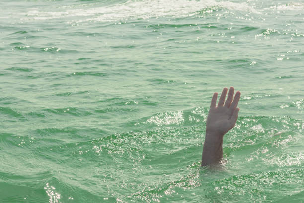 istock A sinking person, the salvation of a drowning man 936272908