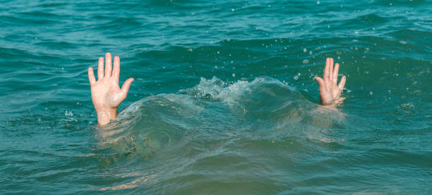 istock A sinking person, the salvation of a drowning man 936273130