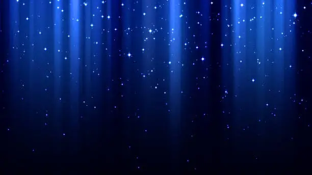 Photo of Blue abstract background with rays of light, sparkles, northern lights, night starry sky
