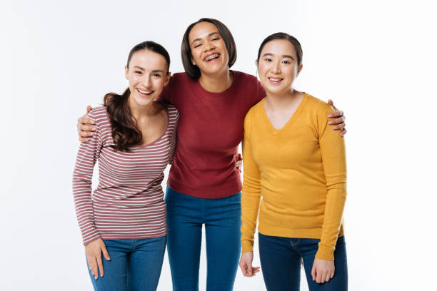 istock Positive female friends standing together 936275706