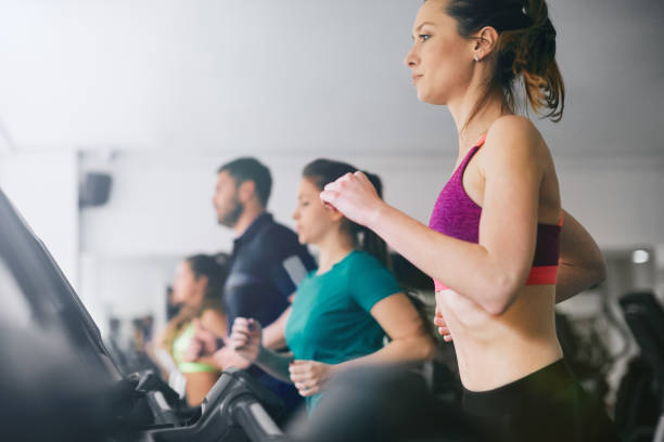 istock People working out in the gym. 936276672