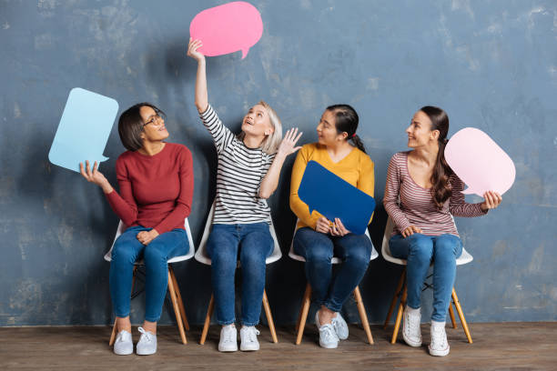 istock Attractive friendly women talking to each other 936278060