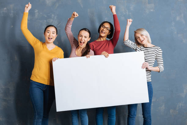 istock Happy cheerful women looking at you 936278418