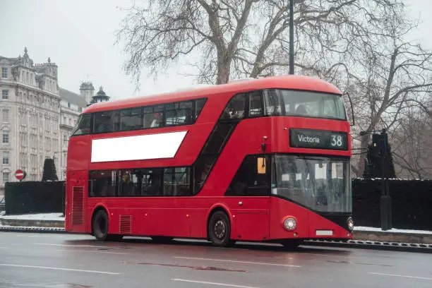 A modern London bus with blank billboard