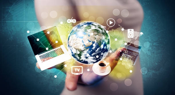istock Business person holding laptop and globe 936279438