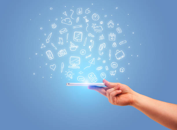 istock Hand with phone and drawn office icons 936280380