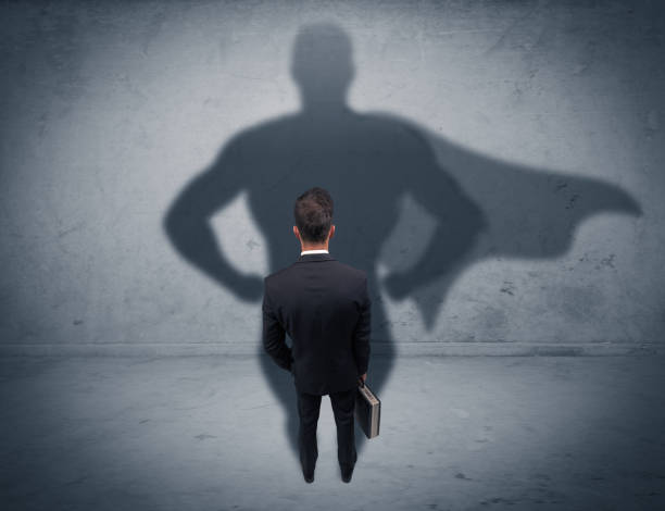 istock Successful businessman with superhero shadow 936282826