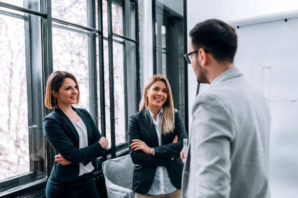 istock Group of business people discussing project. 936283982