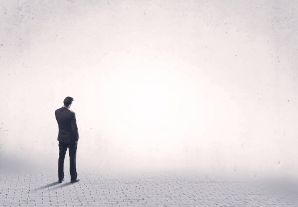 istock Elegant person standing with his back 936285560