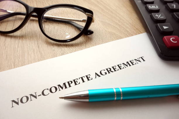 Non-compete agreement Non-compete agreement document for filling and signing on desk, 
business competition concept revenge photos stock pictures, royalty-free photos & images