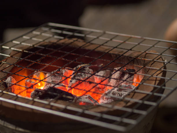 istock Traditional burning Thai Charcoal Stove with grille. 936292618