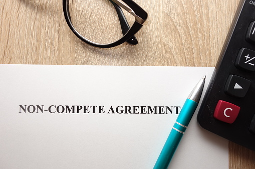 Non compete agreement form on desk
