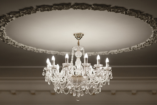 Chrystal chandelier close up. Glamour background with copy space