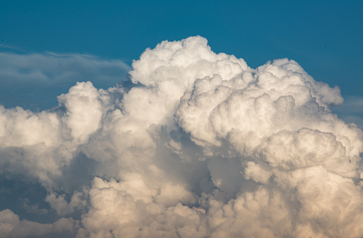 Cumulonimbus clouds form during a summer storm.