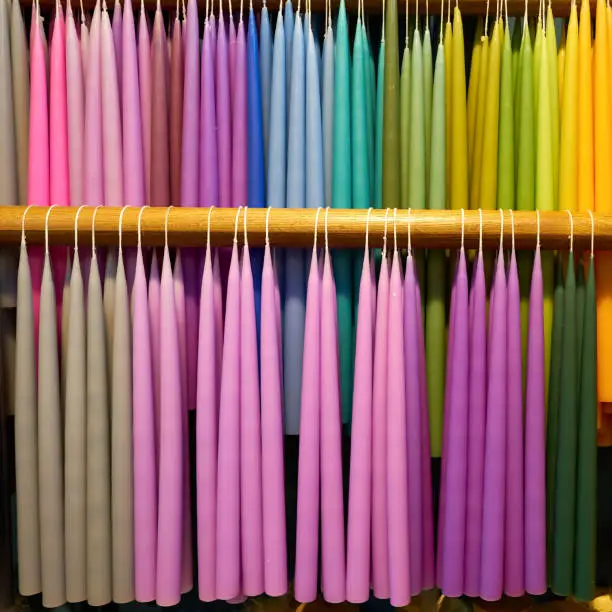 colorful candles in the sales room of a candle manufactory