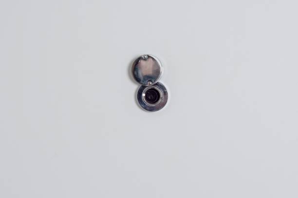 Open door peephole on the white front door