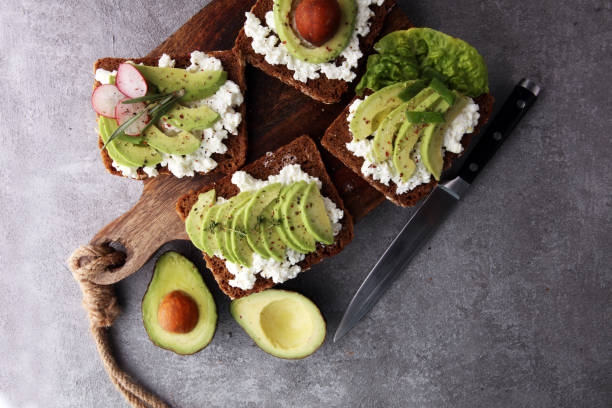 istock sliced avocado on toast bread with spices and avocado 936302340
