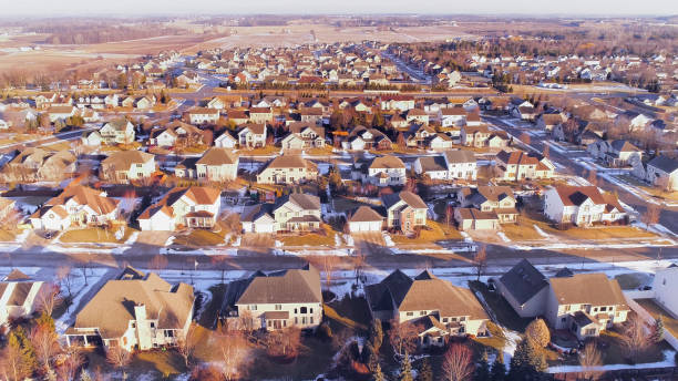 istock Idyllic upper middle class neighborhood in Winter, Aerial view. 936303192
