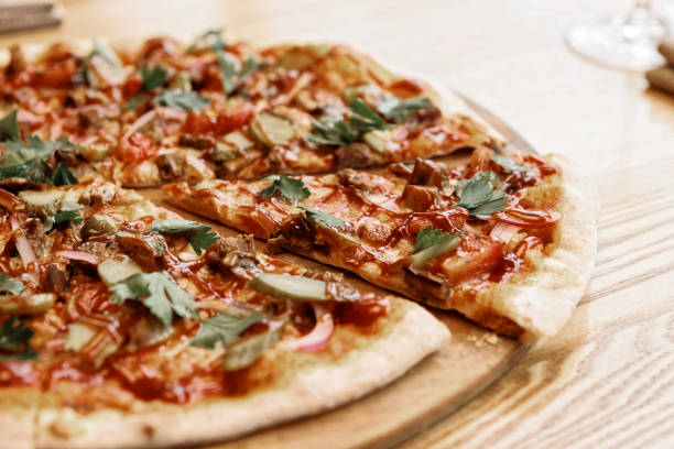 istock Meat pizza with hot bbq sauce, toned 936304928