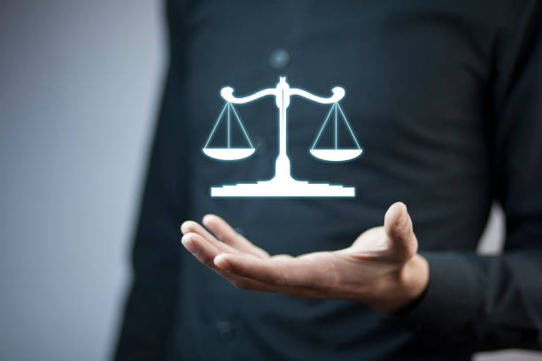 istock businessman hand  scales in screen 936305260