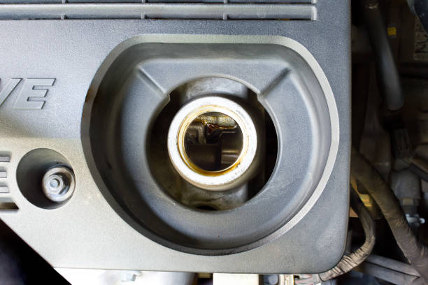 istock Hole for car engine maintenance service, Hole for change engine oil, Can see valve set. 936305658