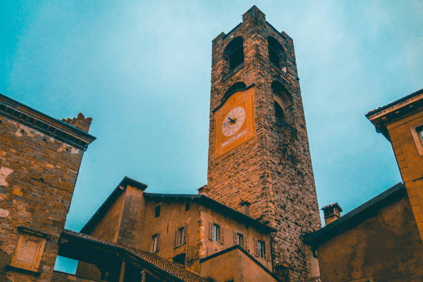 istock historical square formed church tower at bergamo 936307160