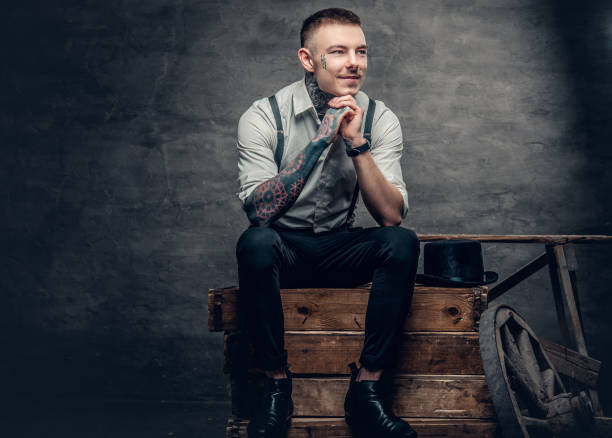 istock A man wearing white shirt and suspenders. 936309120