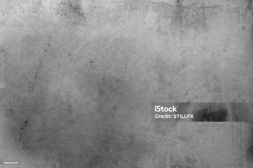 Grey concrete wall Closeup of textured grey concrete wall Concrete Stock Photo