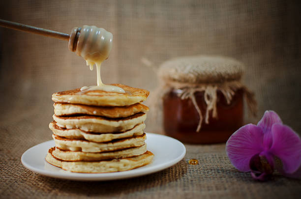 istock Fried pancakes are a mountain on a plate of sweets 936313336