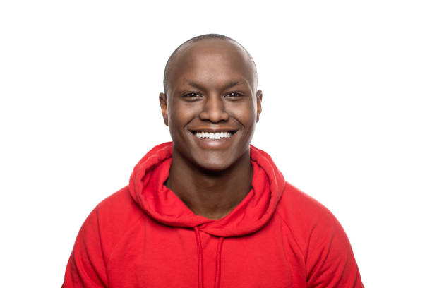 istock Portrait of smiling man with shaved head 936316008