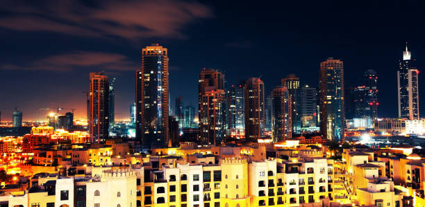 istock Panoramic image of Dubai downtown at night 936316074