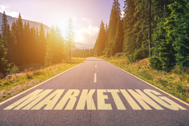 istock Marketing word written on road in the mountains 936316748