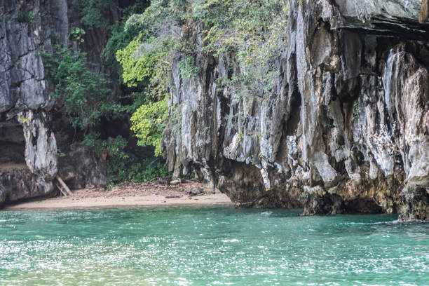 istock Small beach and rock formations on an island in Phang Nga Bay Thailand 936317866