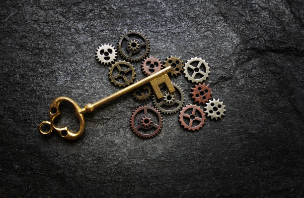 istock Gears and antique key 936318114