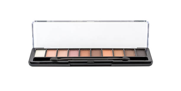 istock Set of makeup eyeshadows with brush. Isolated on white. 936318412