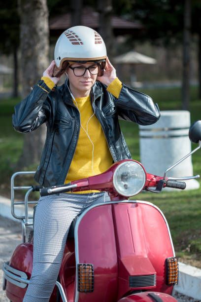 istock girl in the Vespa 936318524