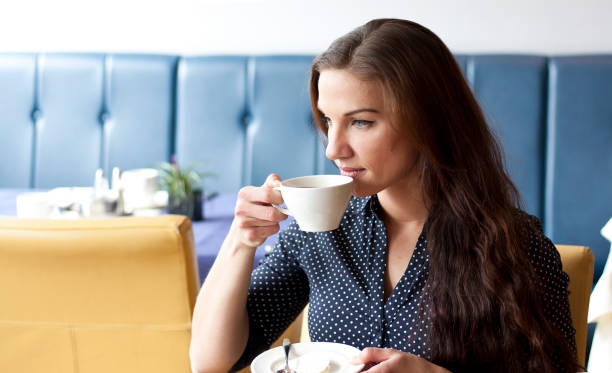 istock Beautifull woman drinking cofee in restaurant 936319842