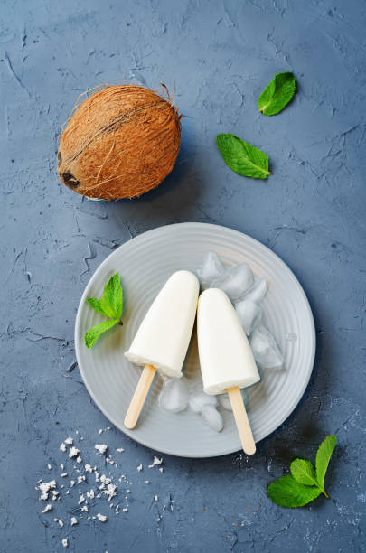 istock Coconut greek yogurt popsicle with mint leaves 936321150