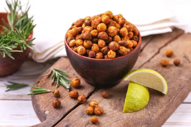 Photo of Indian cuisine. Roasted chickpeas with lime and rosemary