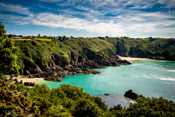Moulin Huet Bay and Petit Port, St Martins, Guernsey, Channel Islands Moulin Huet Bay and Petit Port, St Martins, Guernsey, Channel Islands new brunswick canada photos stock pictures, royalty-free photos & images