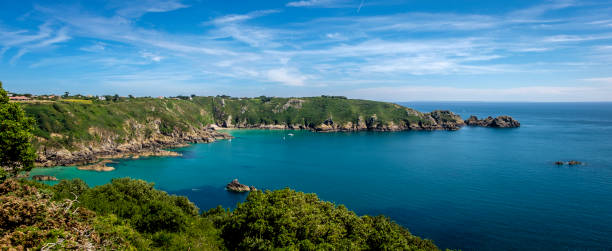 Moulin Huet Bay and Petit Port, St Martins, Guernsey, Channel Islands Moulin Huet Bay and Petit Port, St Martins, Guernsey, Channel Islands st. martins stock pictures, royalty-free photos & images
