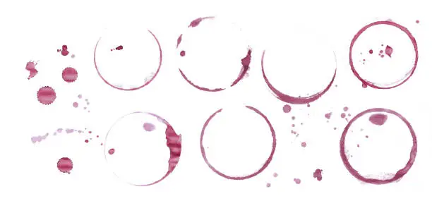 Photo of Red wine stain rings isolated on white background