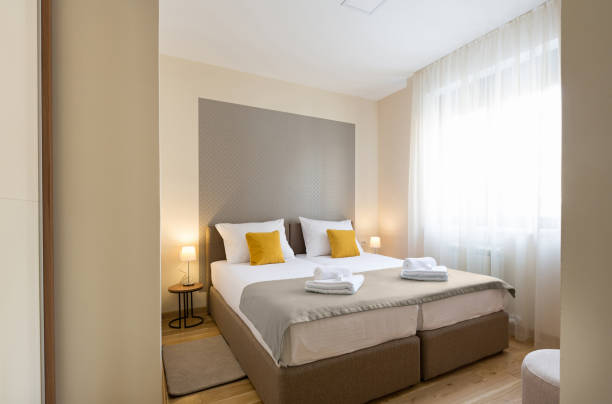 istock Interior of a hotel bedroom with double bed 936326384