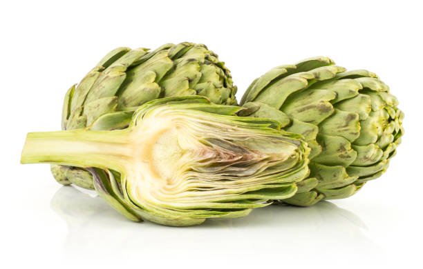 istock Fresh raw artichoke isolated on white 936328862