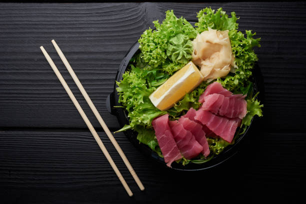 istock Asian or japanese salad in a plastic bowl or plate. 936329130