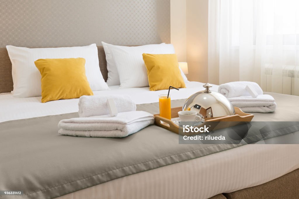 Breakfast served on a hotel bed Hotel Stock Photo