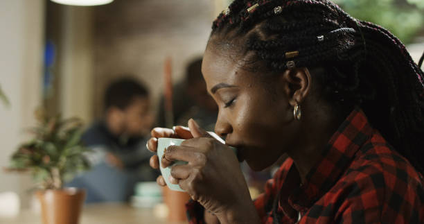 istock Young black girl drink cofee 936331622